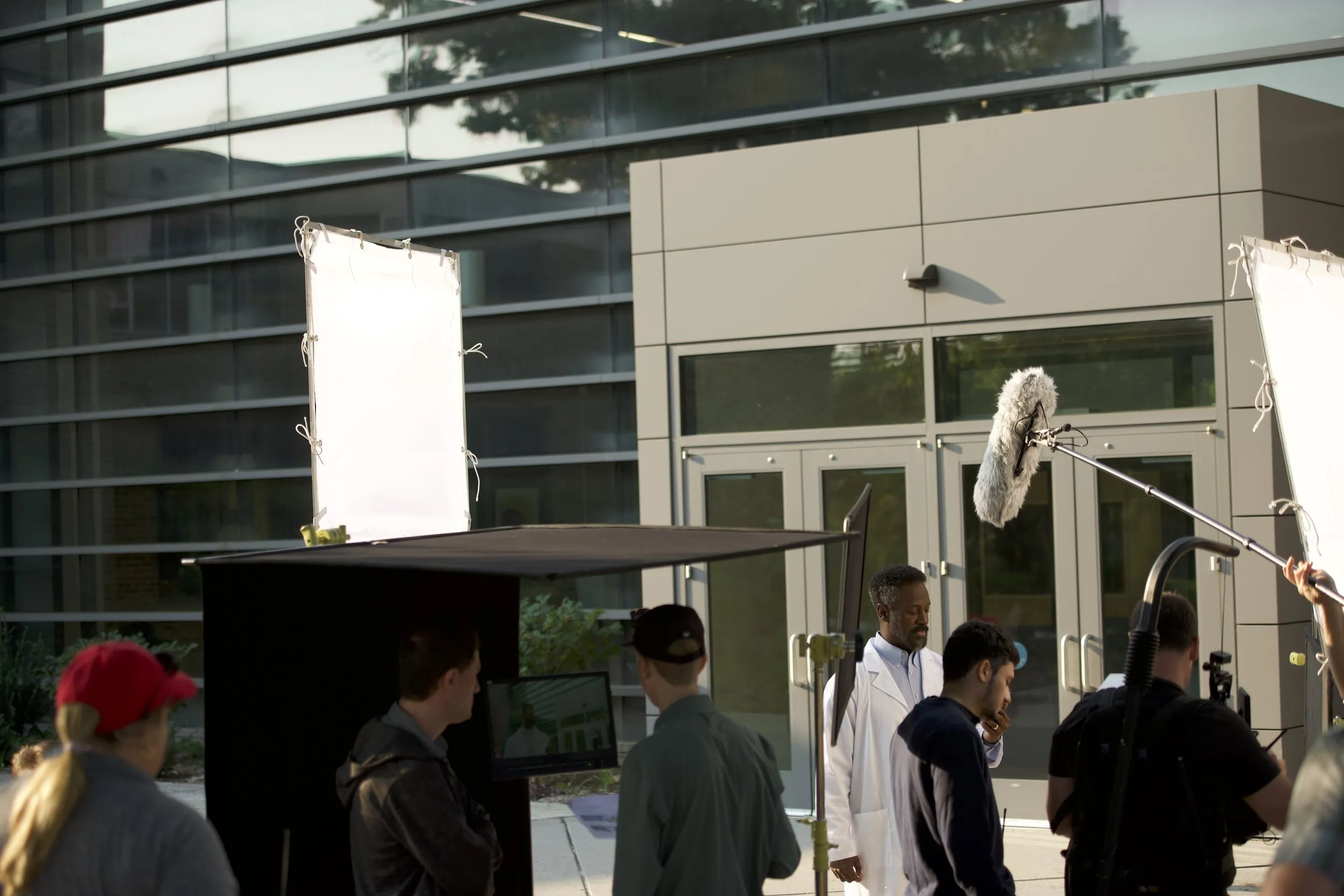 Director working with talent on commercial video shoot